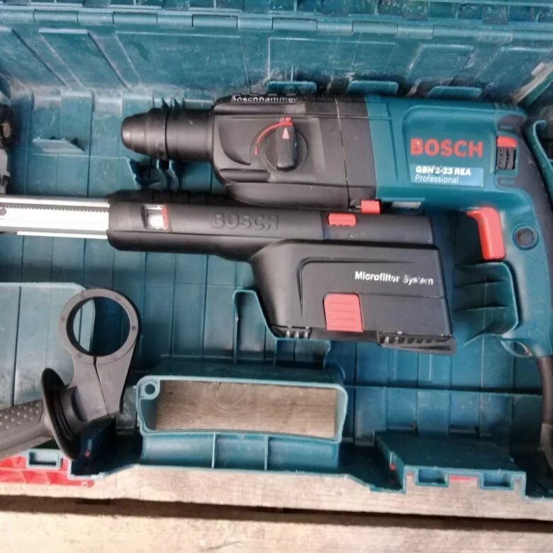 Перфоратор бош с пылесборником. Перфоратор bosch gbh 2-23. перфоратор бош gbh 2-23 rea. перфоратор bosch с пылесосом gbh 2-23. перфоратор бош 2-23 с пылесборником.