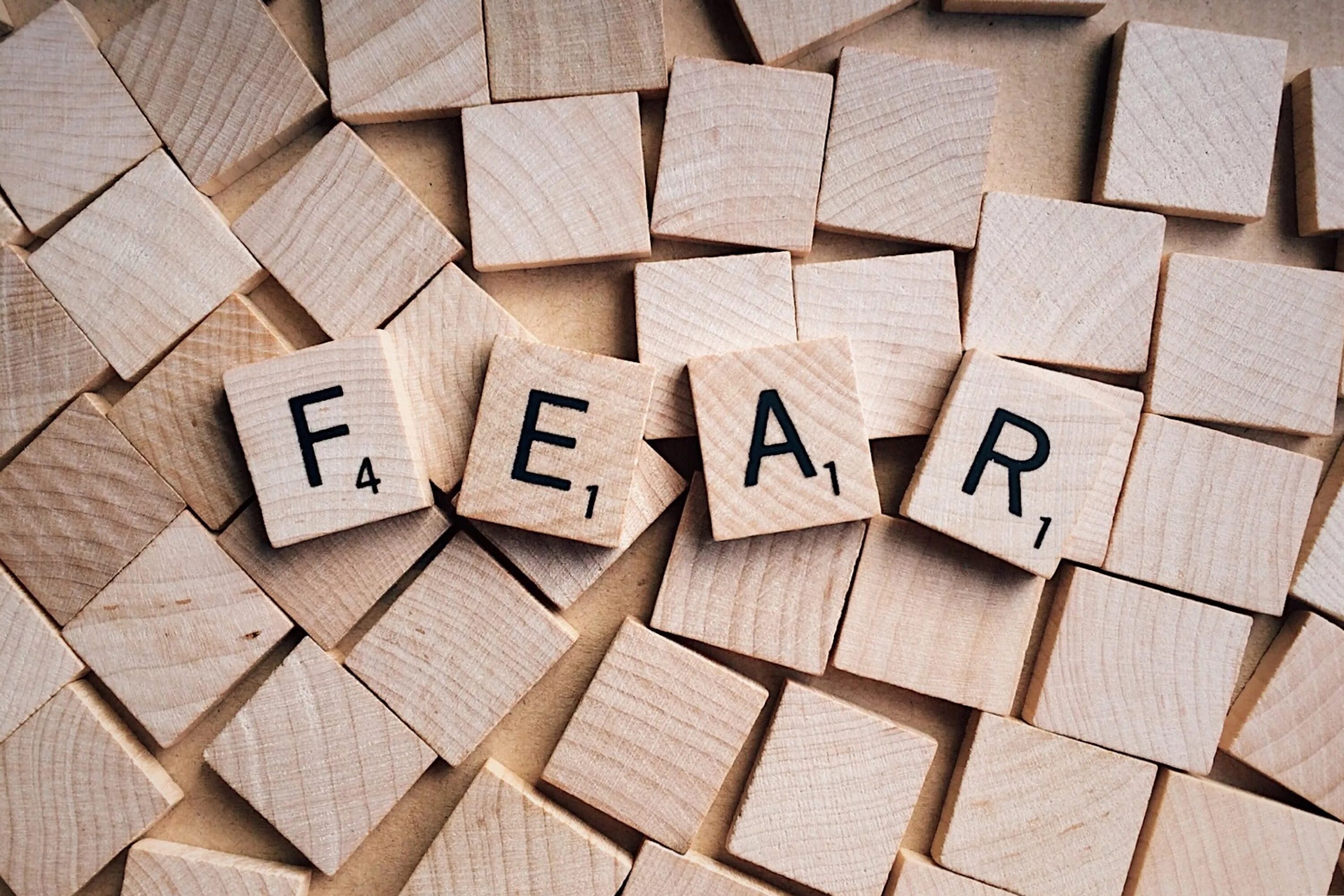 Keeping the fear. Скрэббл реклама. Слово Fear Art. Random Letters Scrabble.