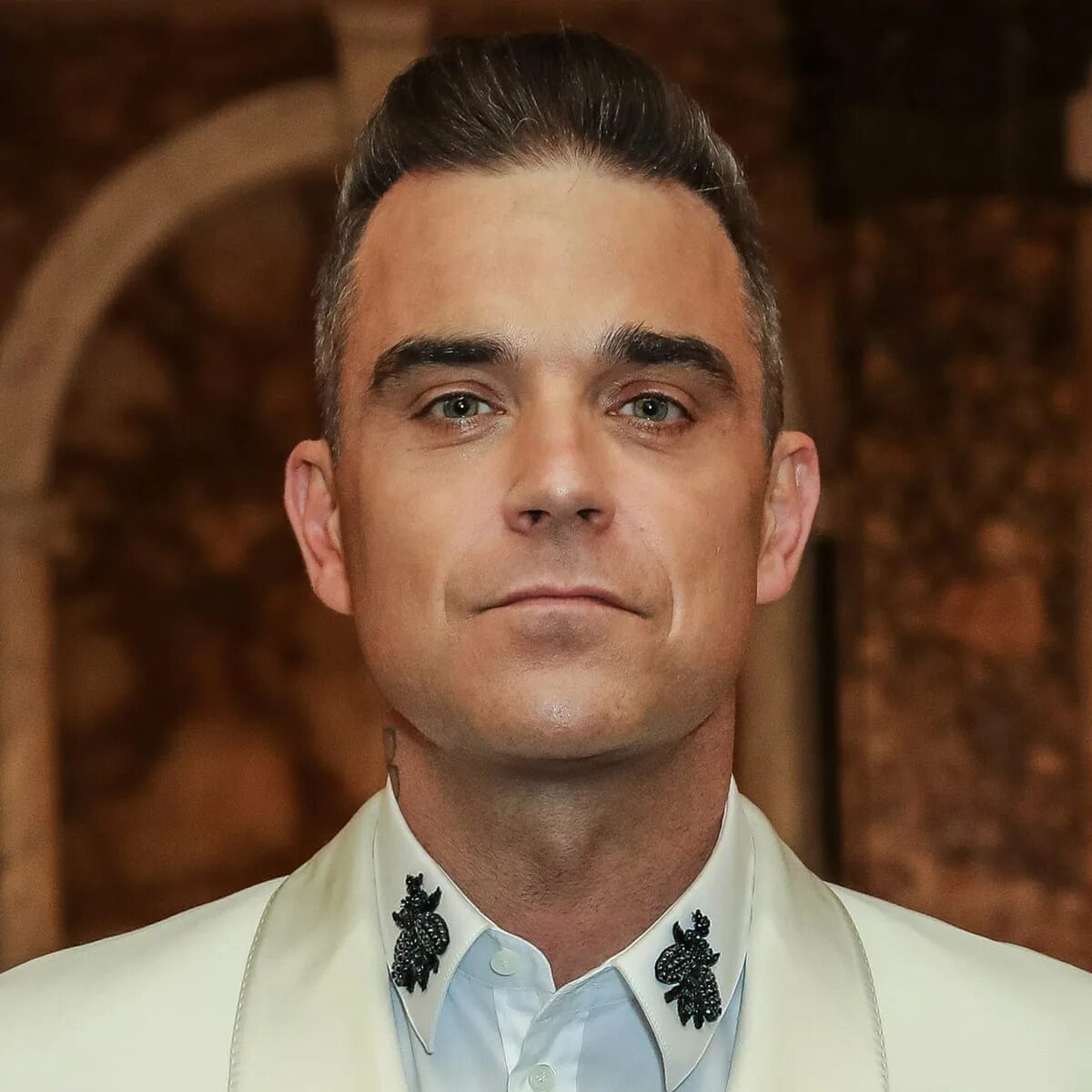 Робби уильямс тексты. Робби уильямс. робби уильямс певец. robbie williams 2006. робби уильямс молодой.