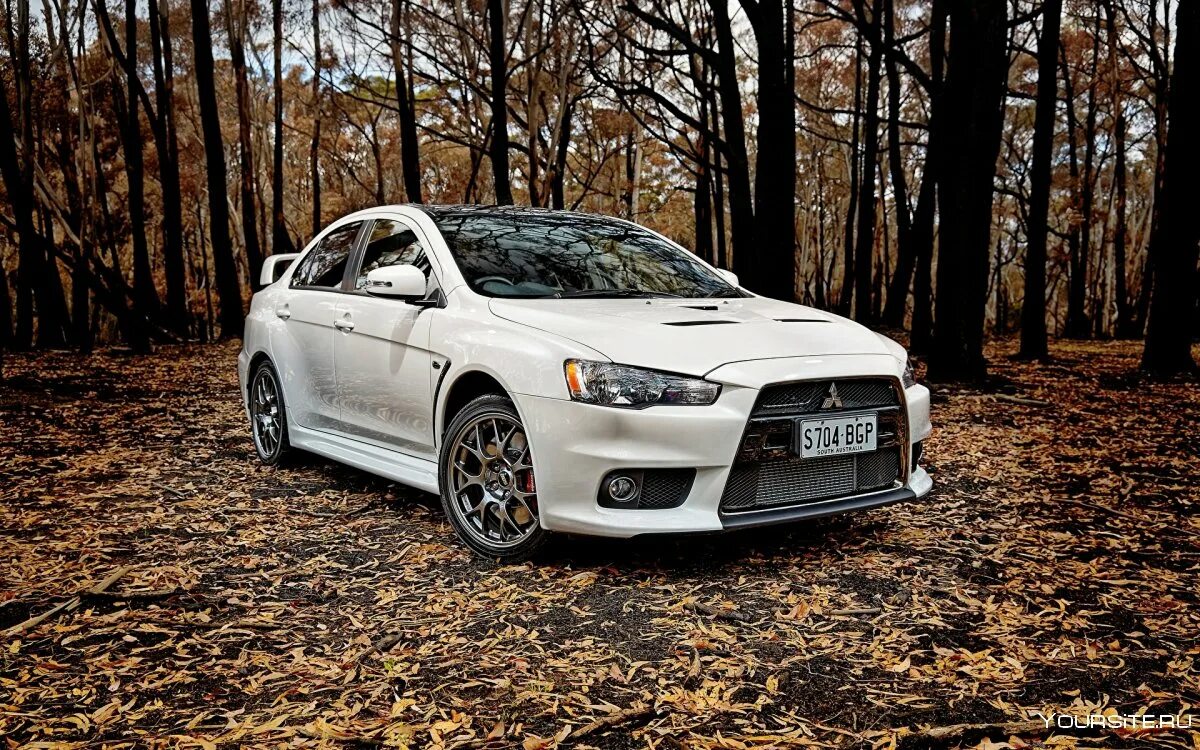 Mitsubishi evo x. Митсубиси Эво 10. Мицубиси Лансер 10 Эволюшн. Mitsubishi Lancer Evolution 10 White. Mitsubishi Lancer Evolution x 10.