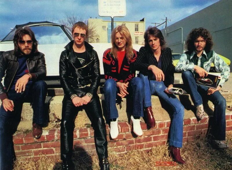 Группа джудас прист. Judas priest 1978. Judas priest. Judas priest часы из виниловой пластинки. Джудас прист в 1978.