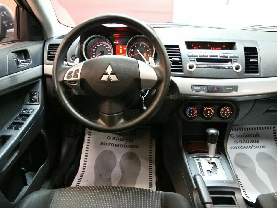 Митсубиси лансер 10 2.0 вариатор. Лансер 10 автомат. лансер 10 1.8. салон lancer 10 2008. митсубиси лансер 10 2.0 автомат.