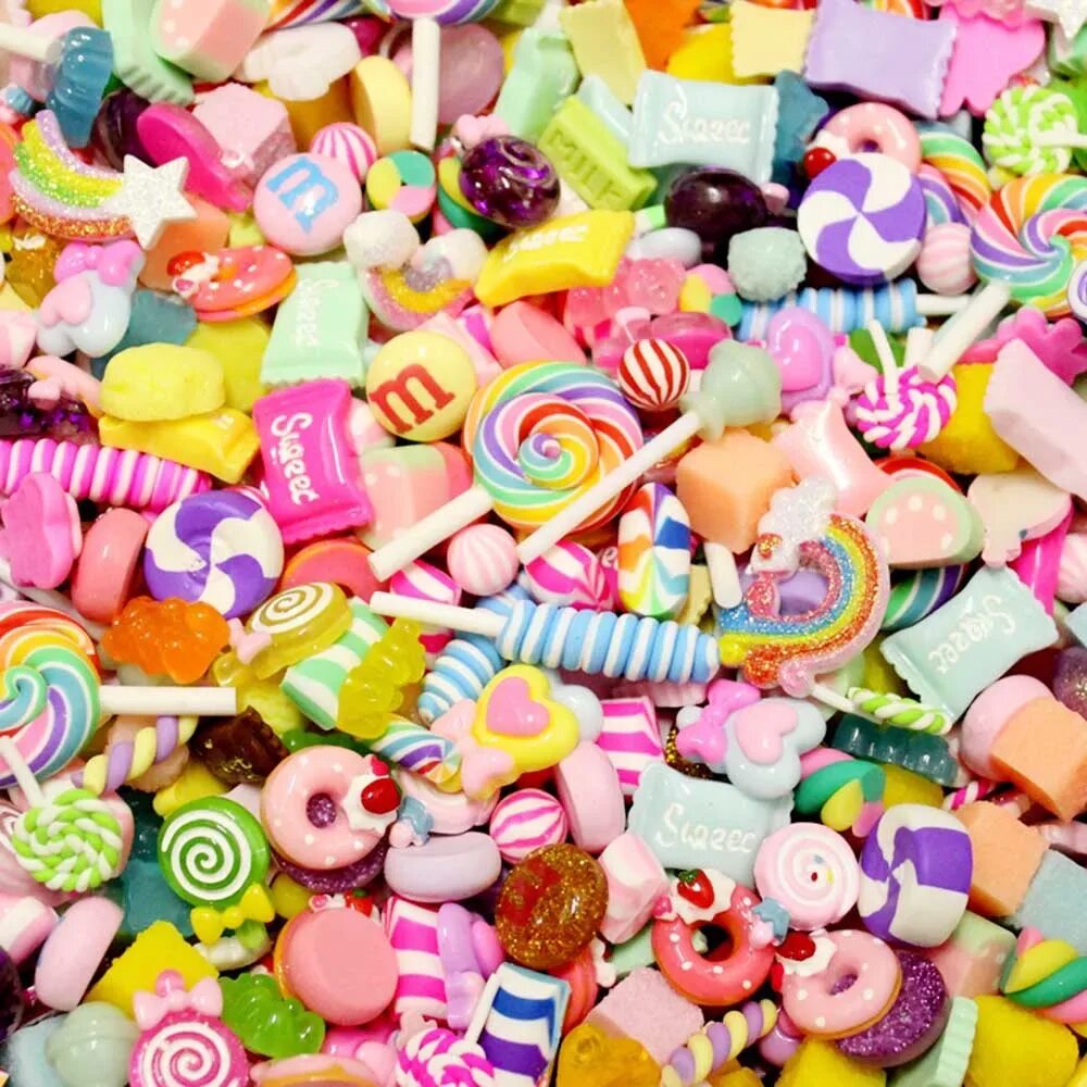 И ласковей морей сладости. Детские сладости. Много сладостей. Сладости конфеты. Конфеты разноцветные.