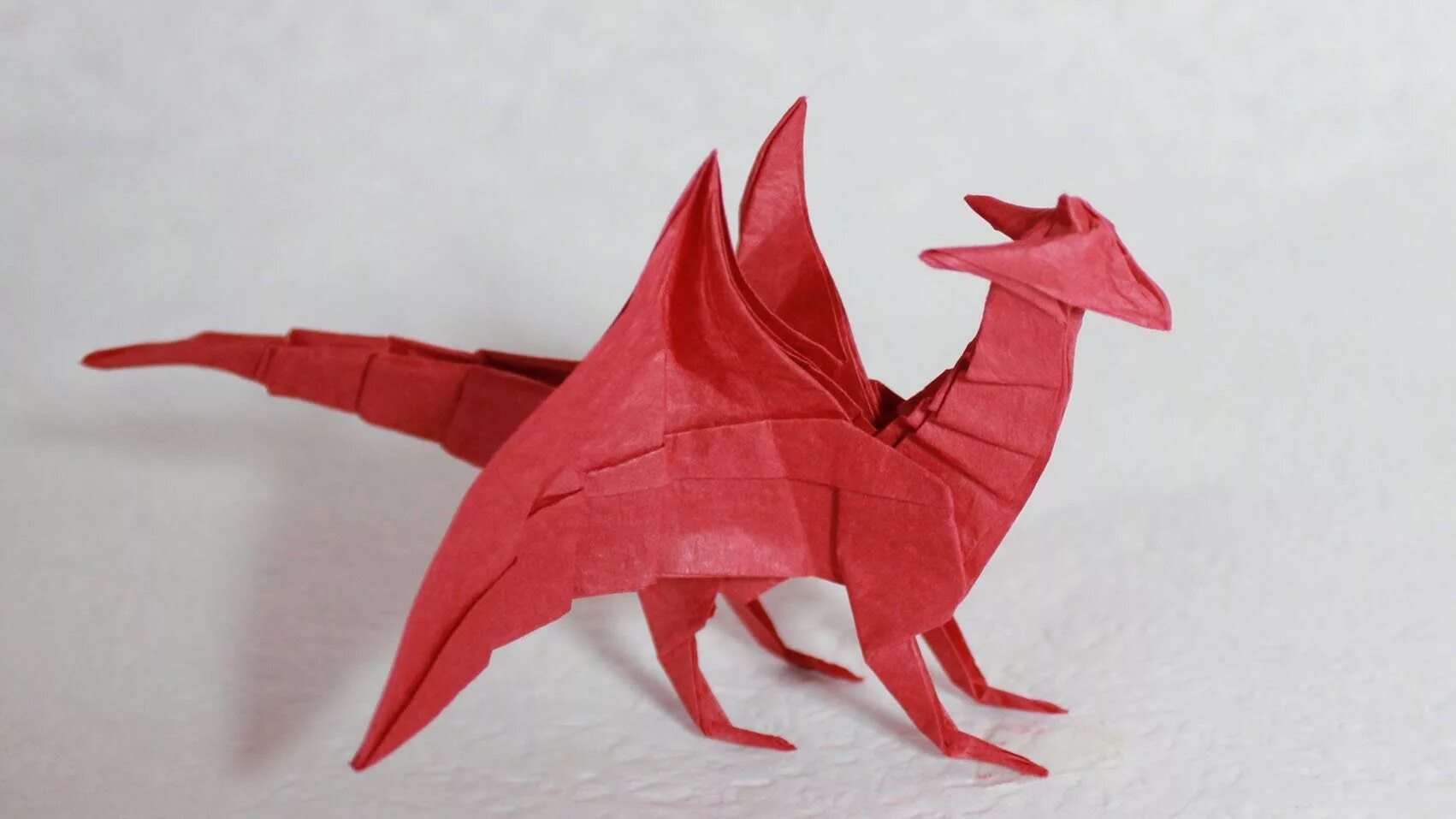 Дракон из бумаги без клея. Бумажные драконы. Оригами дракон. Поделка дракон из бумаги. Поделка дракон простая.