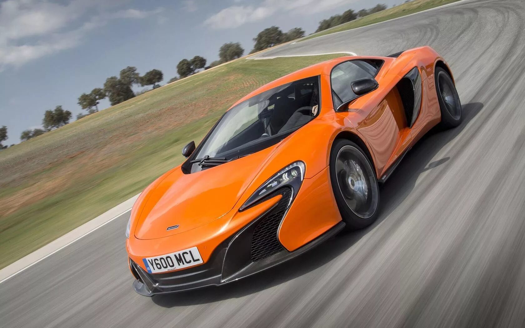 Машина mclaren. MCLAREN 650s 2014. MCLAREN 650s. Макларен 650. Макларен 520s.