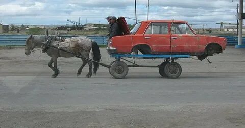 Везут меня из города колеса