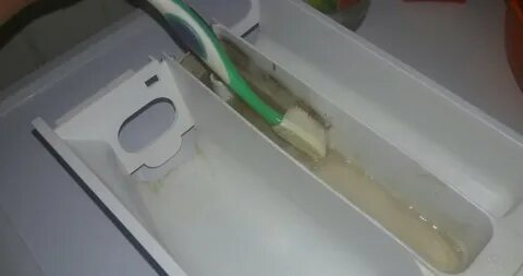 Почистить контейнер в стиральной машине