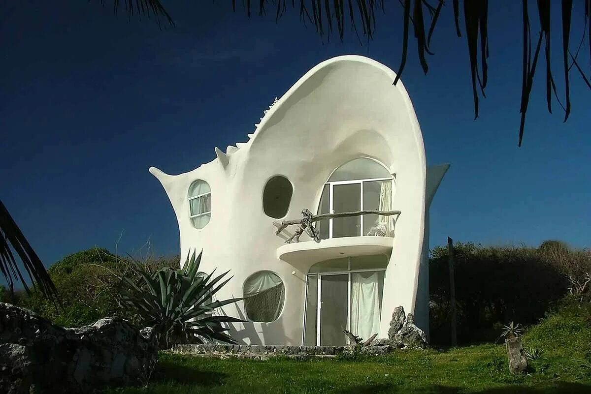 Включи дом мир. Conch Shell House (Исла-Мухерес, Мексика). Исла Мухерес дом Ракушка. Здание Ракушка Мексика.