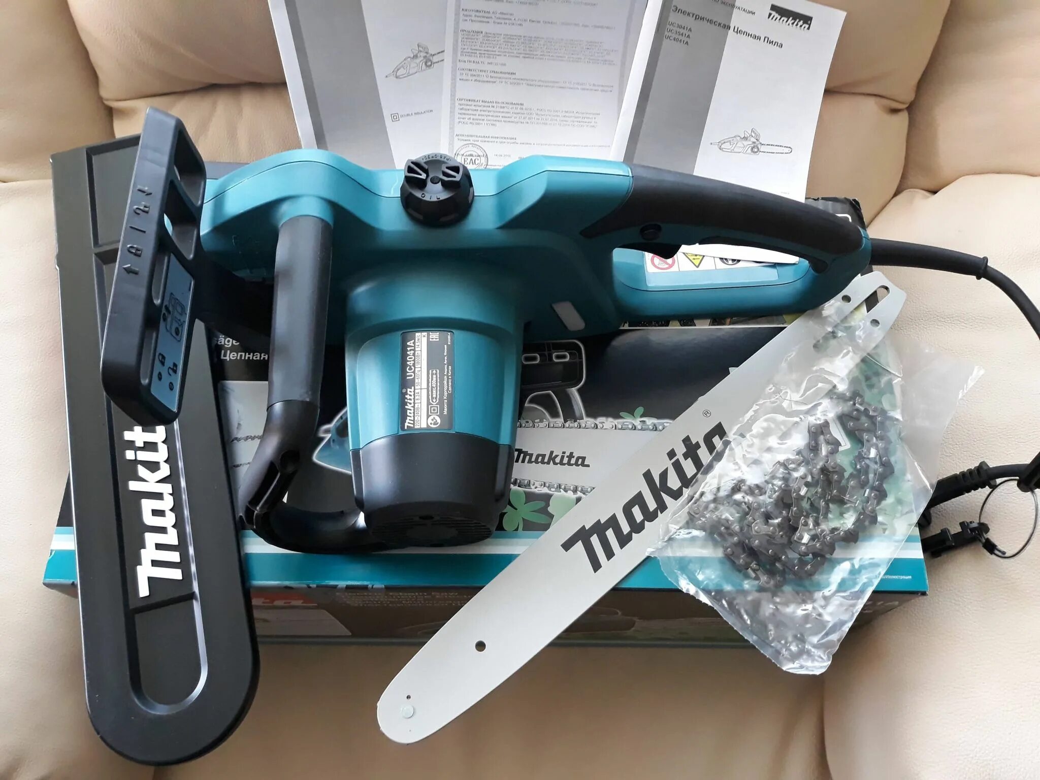 Пила цепная uc4041a. Makita uc4041a. Пила электрическая Makita 4041a. Пила цепная Makita uc4041a. Makita uc4041a кейс.