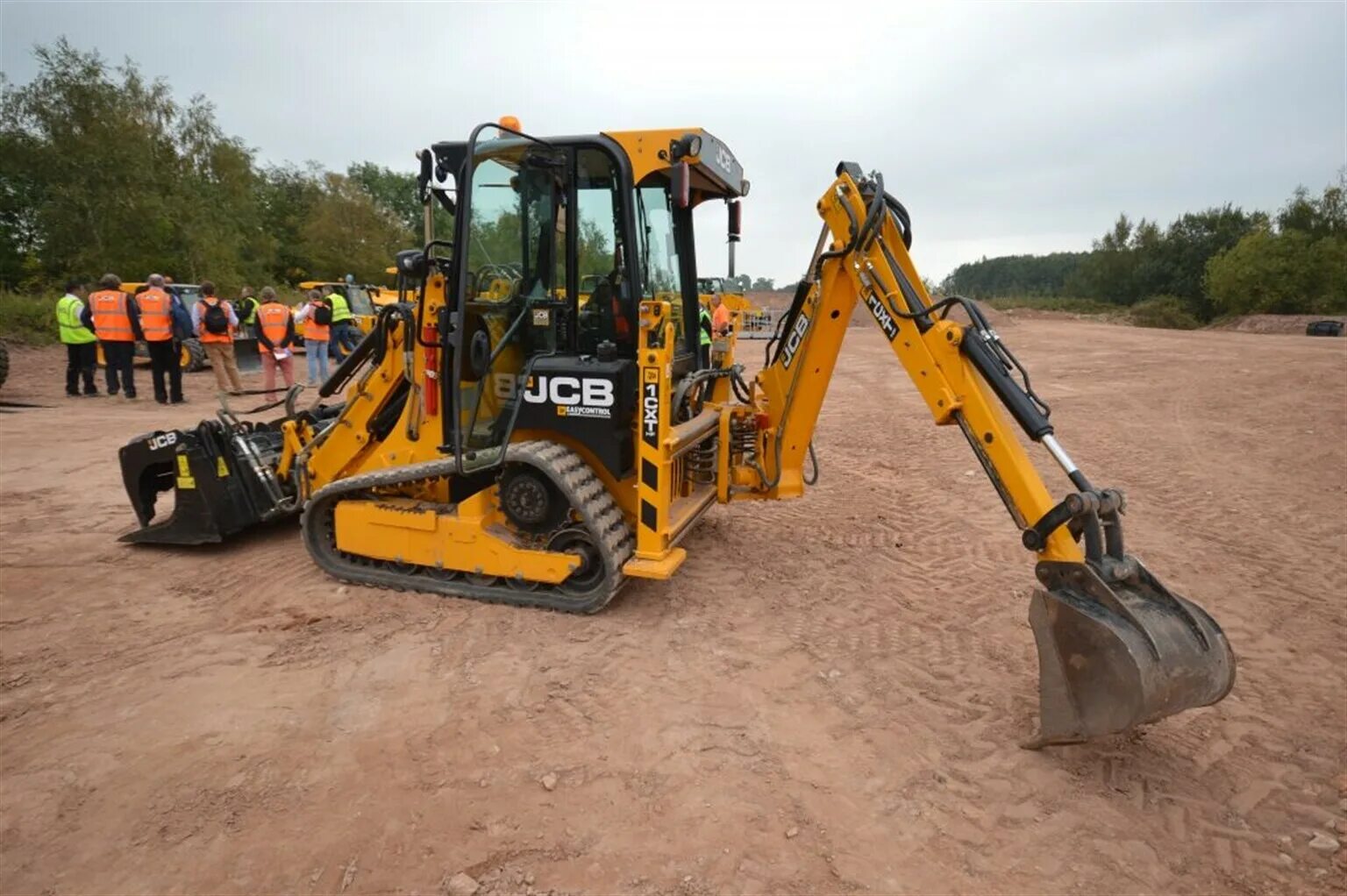 Б у экскаватор погрузчик купить недорого. JCB 1cx гусеничный. Экскаватор-погрузчик JCB 1cx. Погрузчик JCB 1cx. JCB Mini CX.