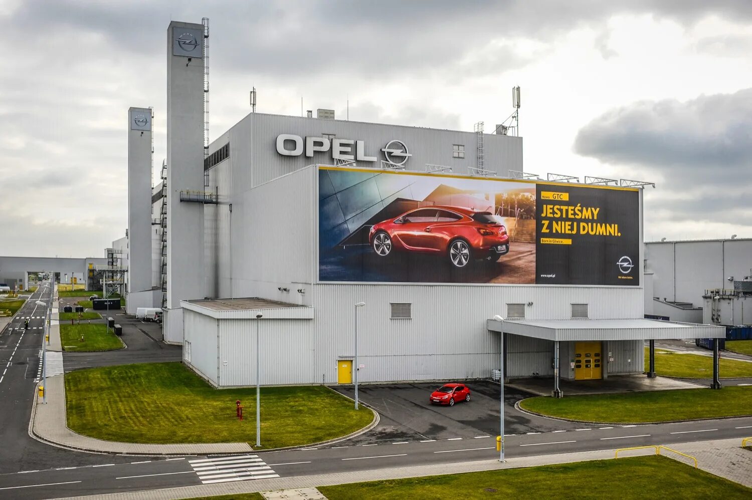 Компания opel. Opel завод в Германии. Завод Опель в Гессене. Штаб квартира Опель в Германии.