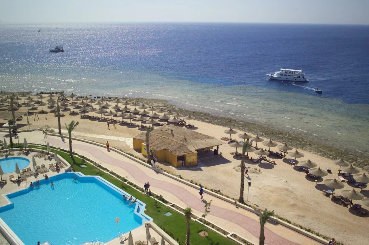 Sunrise remal beach шарм эль шейх. Sunrise remal beach resort (ex. melton beach) 5* шарм-эль-шейх, рас насрани. отель мелиа синай шарм-эль-шейх. sunrise отель египет шарм-эль-шейх remal. санрайз ремал резорт отель египет.