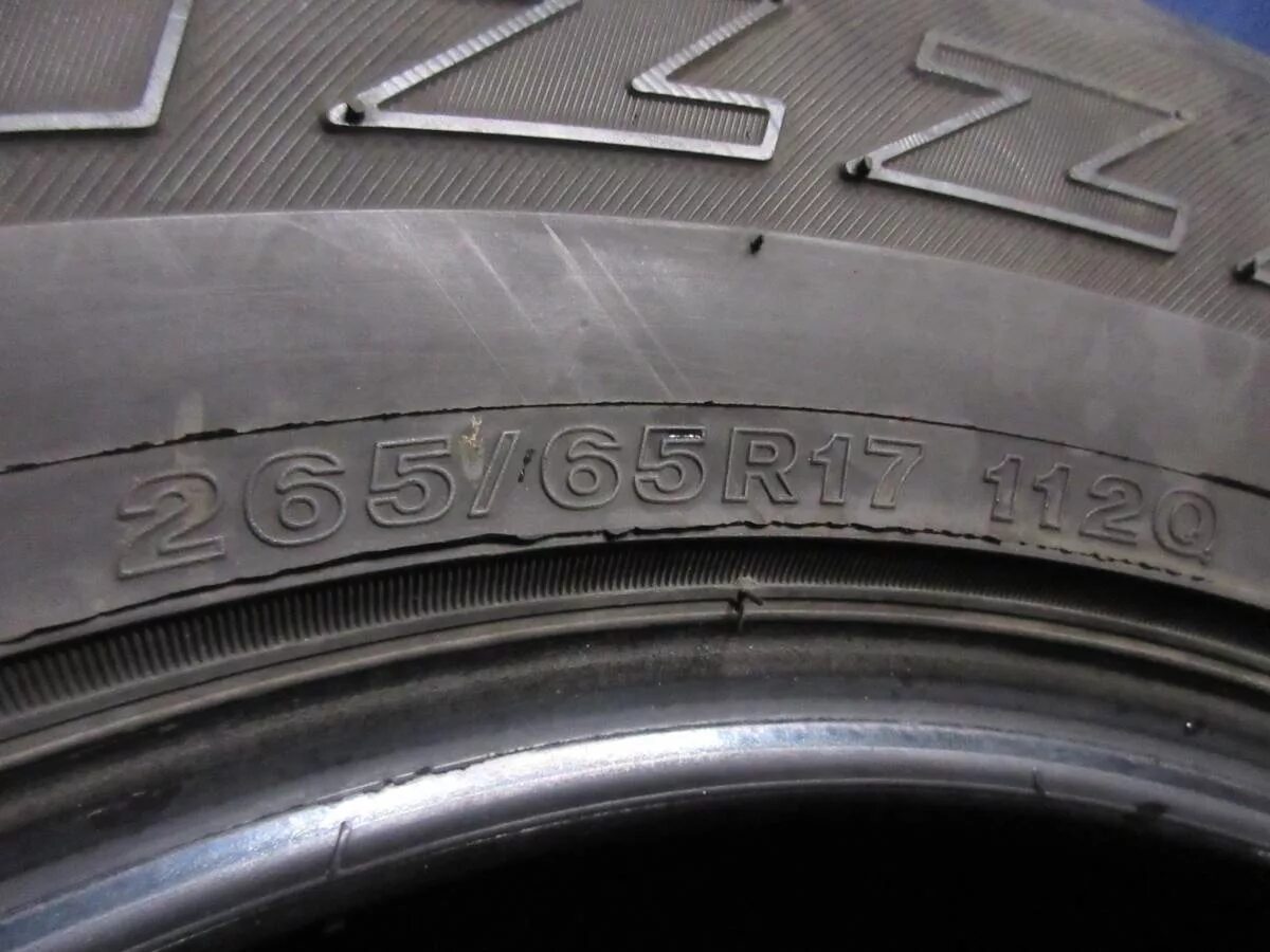 Где на шинах год выпуска фото. Дата производства шин Бриджстоун. Bridgestone 613v. Год производства шин Бриджстоун. V6d4621 маркировка шин Бриджстоун.