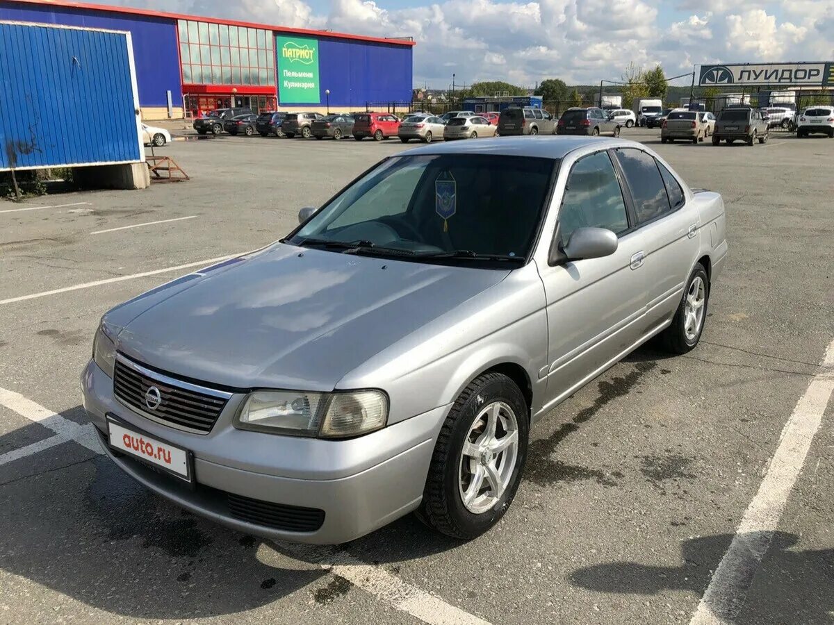 Nissan sunny 2000 год. Ниссан санни праворукий 1998. Ниссан санни какая. Ниссан санни b15. Ниссан санни b15.