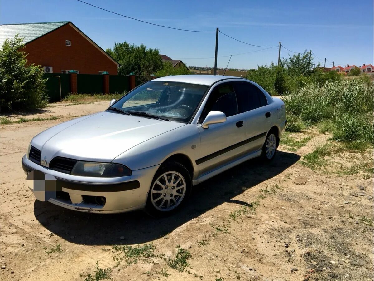 Мицубиси каризма замена. Мицубиси Каризма 2002. Mitsubishi Carisma 2002 Рестайлинг. Митсубиси Каризма 2002 1.6. Митсубиси Каризма 2001 1.6.