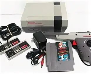 Nintendo первая. Nintendo 1. Nintendo Entertainment System NES-001. Nintendo NES 220v AC. Самая 1 Нинтендо.