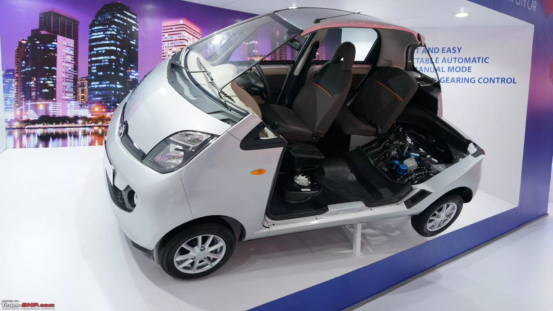 Самая дешевая машина купить. Tata Nano. Тата нано 2014. Тата нано машина. 2023 Tata Nano SUV.
