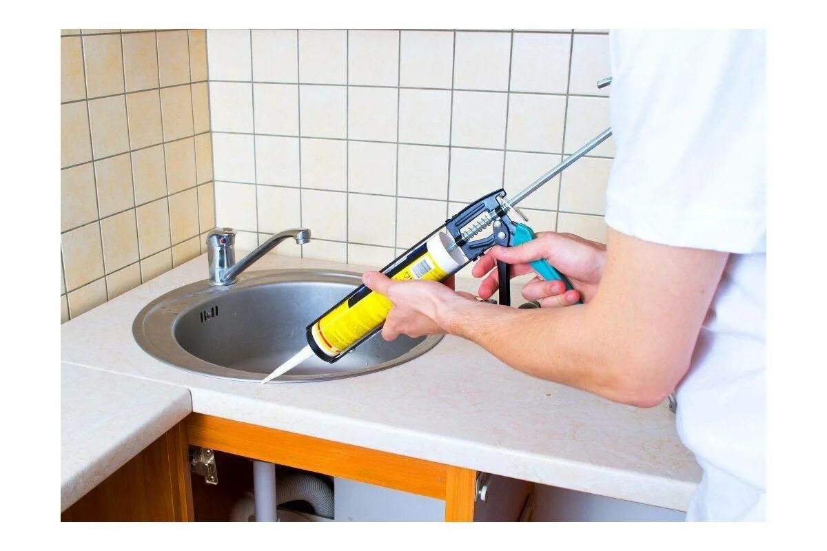 Крепления для накладной мойки из нержавейки на тумбу. Как закрепить кухню. Сборщик кухонного гарнитура. Сборка кухни. Крепление крана к раковине.