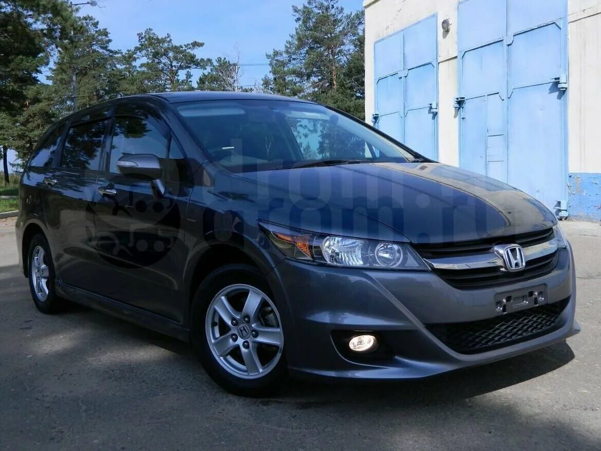 Купить хонда стрим в новосибирске. Honda Stream 2011. Хонда стрим 2 Рестайлинг. Honda Stream 2011 rsz. Хонда стрим 2011 года.