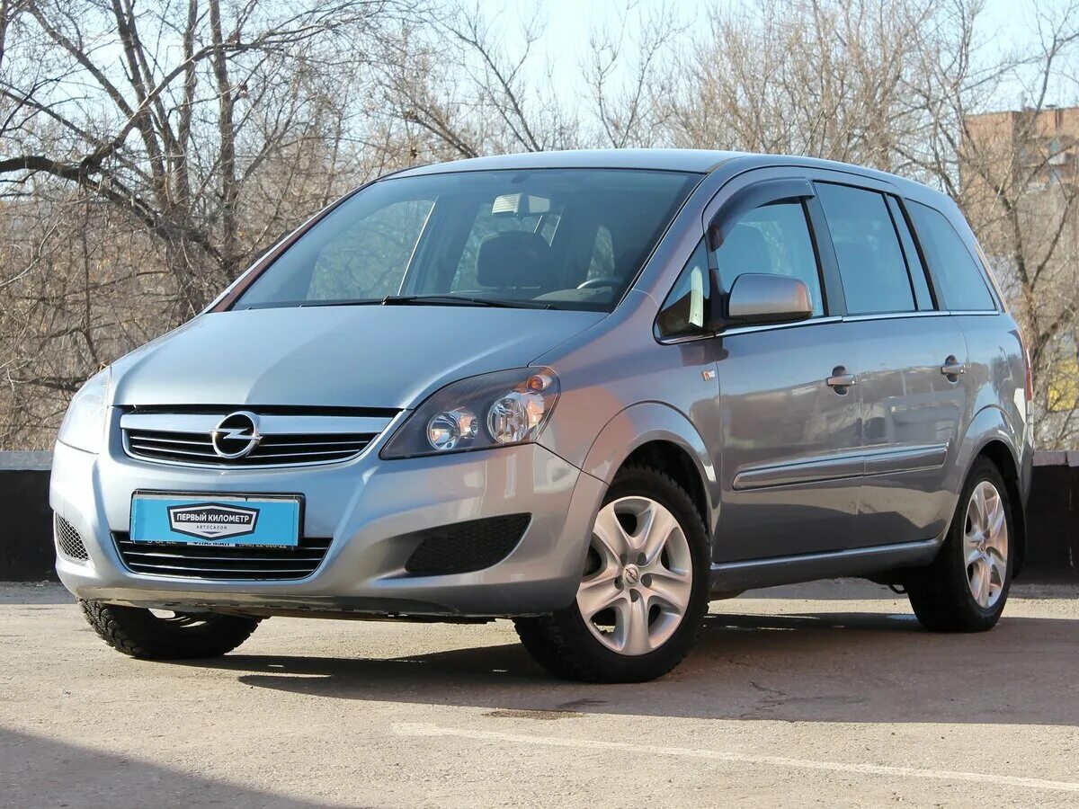 Шины зафира б. Opel Zafira 2011. Опель Зафира 2011 года. Опель Зафира b 2011. Опель Зафира 2011 1,8.