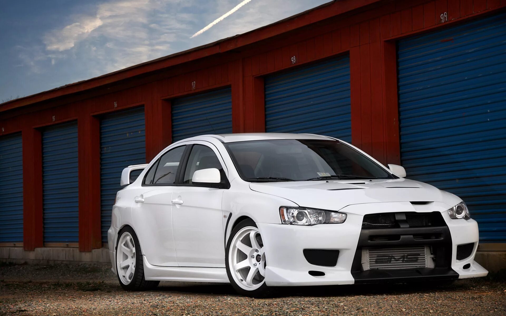 Mitsubishi evo x. Митсубиси Лансер 10 EVO. Мицубиси Эволюшн 10. Mitsubishi Lancer Эво 10. Митсубиси Эволюшн 10 белый.