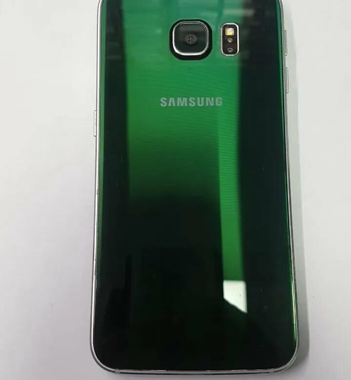 Samsung ultra green. Samsung Galaxy s6 Edge изумруд. Самсунг галакси s6 Edge зеленый. Samsung s6 Emerald Green. Samsung Galaxy s6 Edge зеленый изумруд.