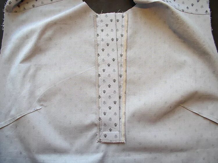 планка на пуговицах. пошив застежки поло. цельновязанная планка для кардигана. ральф лоурен поло пуговицы. планка на пуговицах.