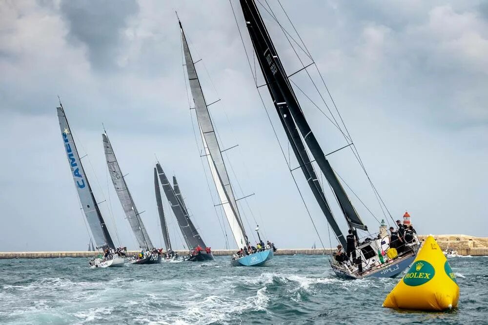 Sea racing. Rolex Middle Sea Race. Регата Rolex. Регата в Хэмптон-корте. Регата в Средиземном море.