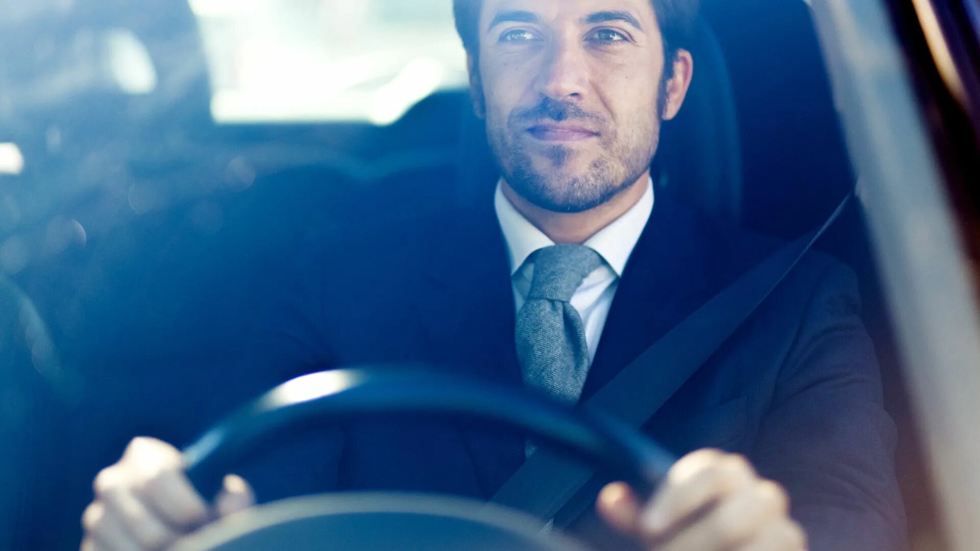 Driving a car a man