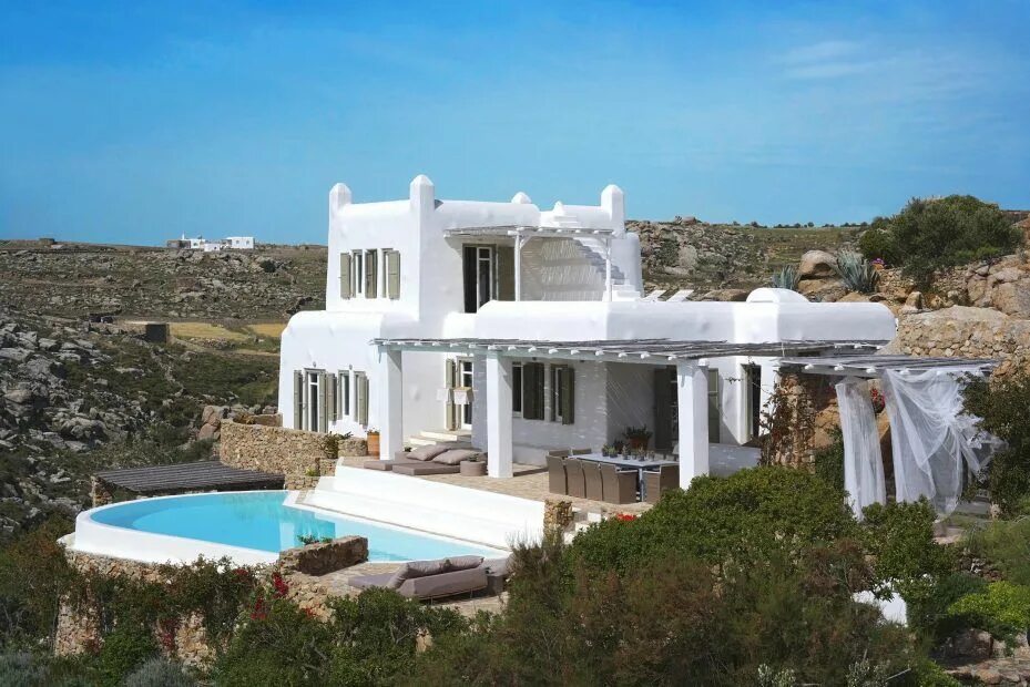 Unwind by the pool at Yria Resort's amazing villa on the island Paros, Cyclades,