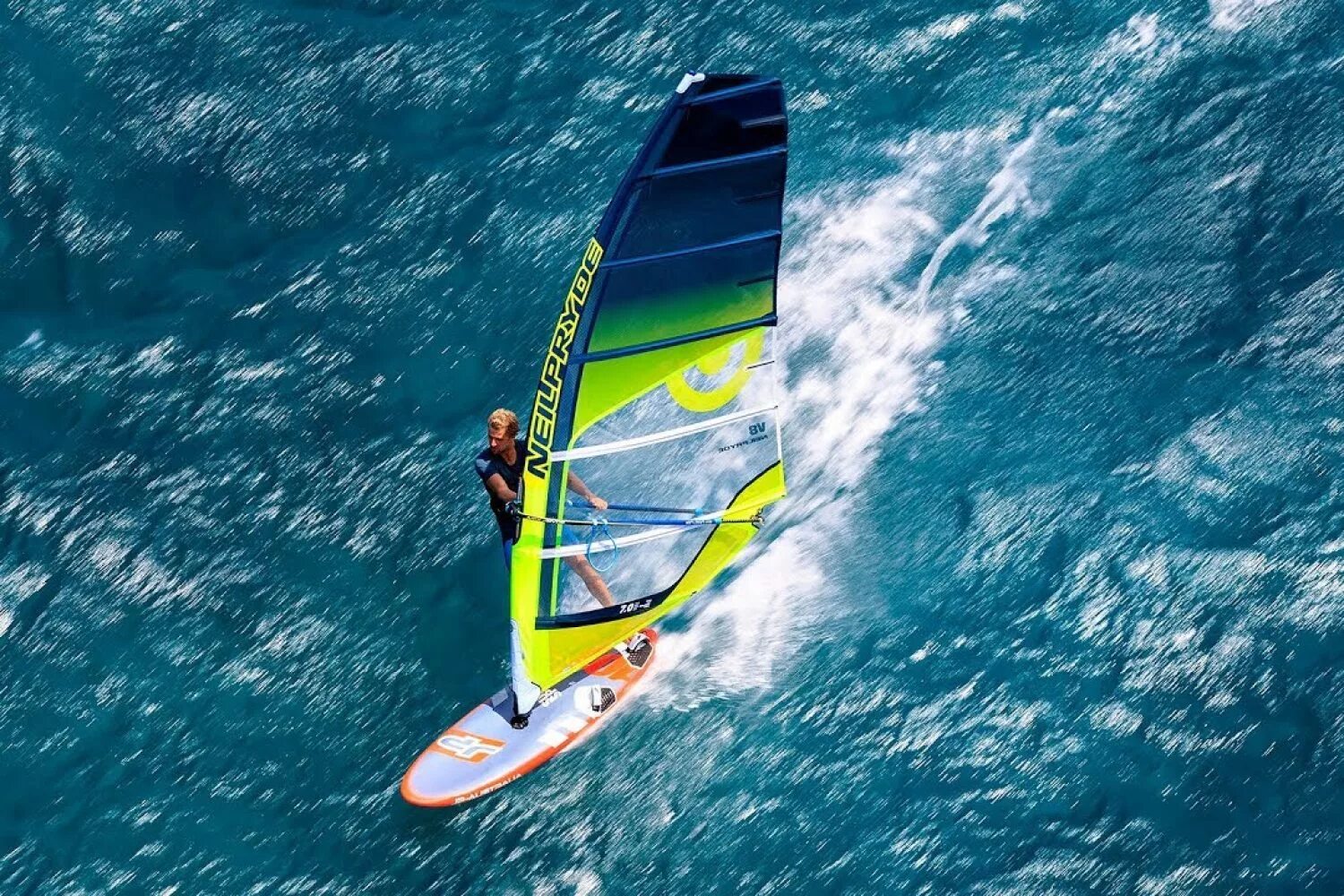 Complete the exchanges he is on windsurfing