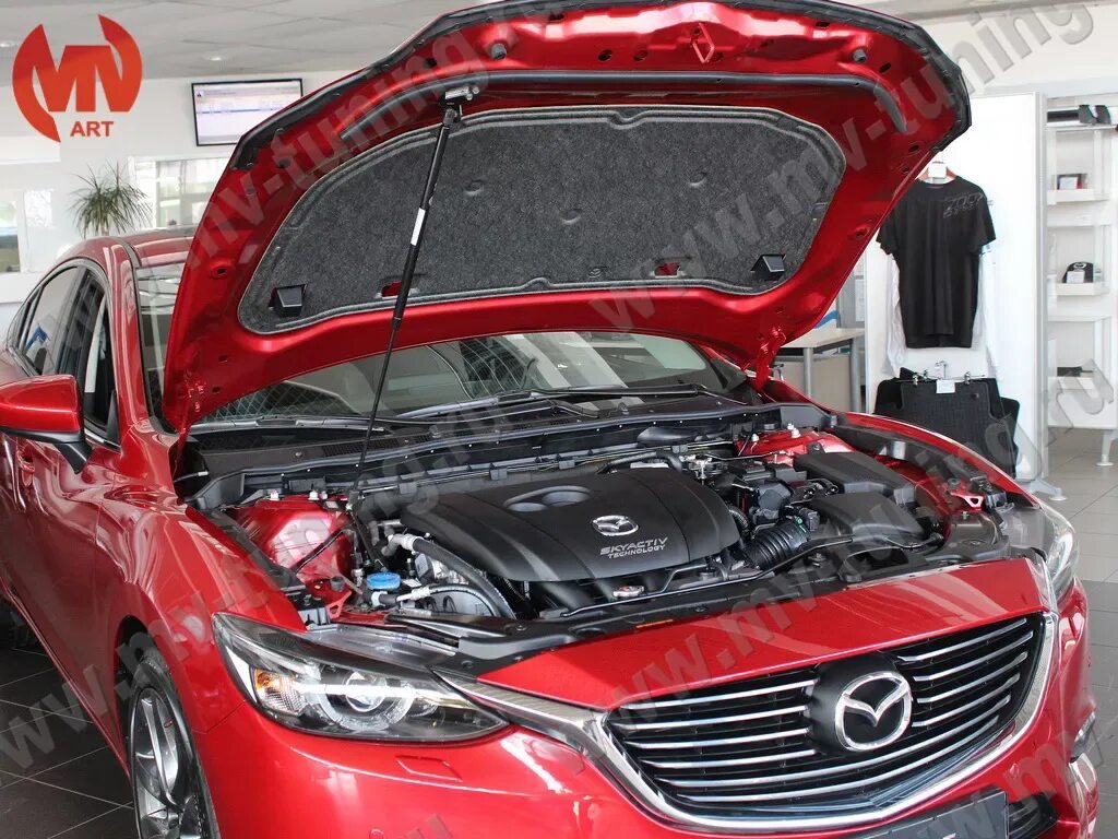 Газовые упоры капота мазда. Газовые упоры капота Мазда 6 GJ. Упор капота Mazda 6. Мазда 6 с открытым капотом. Упоры капота Мазда 6 GJ.