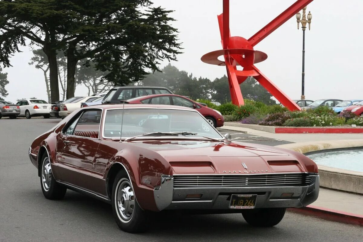 Машина том 1. Oldsmobile Toronado 1966. Олдсмобиль Торнадо 1966. Олдсмобиль Торнадо 1972. Oldsmobile Toronado gt 1966.