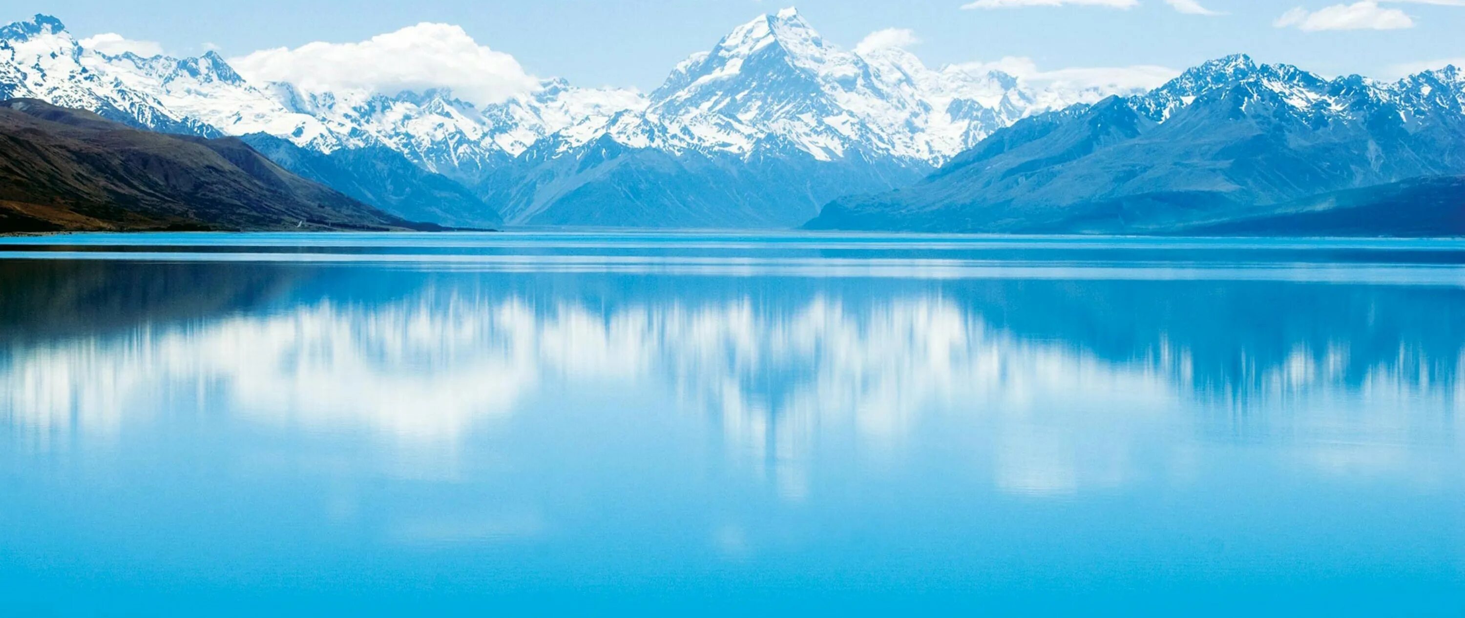 Гори вода. Вода горы фон. Чистая Горная вода. Горы и вода фон панорама. Фон синий горы вода.