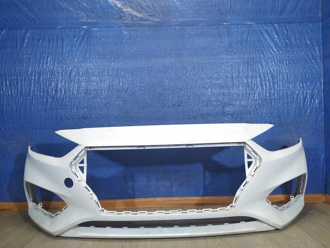 Бампер хендай солярис 2017. Оригинальный бампер на хендай солярис. Hyundai solaris 2017 бампер передний. Передний бампер хендай солярис 2013 черный. Бампер передний солярис 2012.