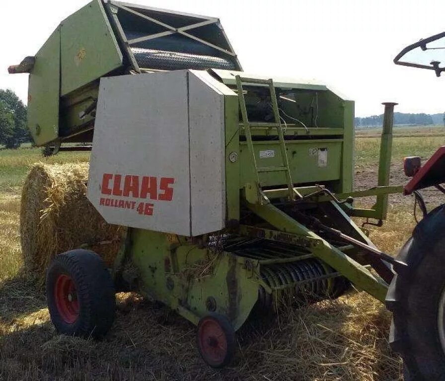 Подборщик claas. Пресс подборщик Роланд. Пресс подборщик класс Роланд 46. Пресс подборщик класролэнт. Роланд 44 пресс подборщик.