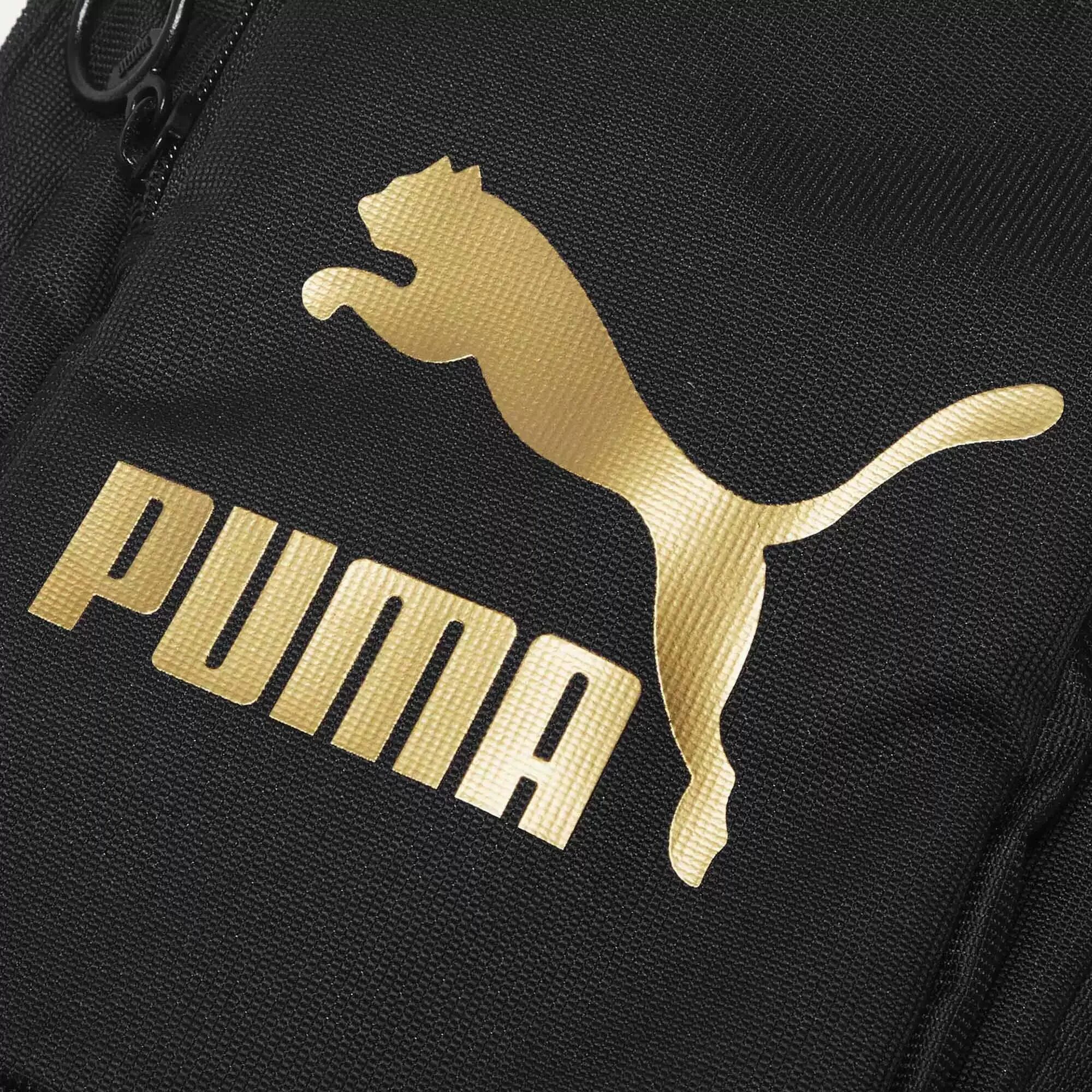 Лого на одежде. Пума. Puma фирма. Значок Пума. Логотип Пума на одежду.