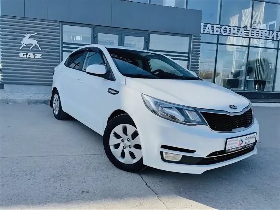 Купить б/у Kia Rio III 1.4 MT (107 л.с.) бензин механика в Череповце: красный Ки
