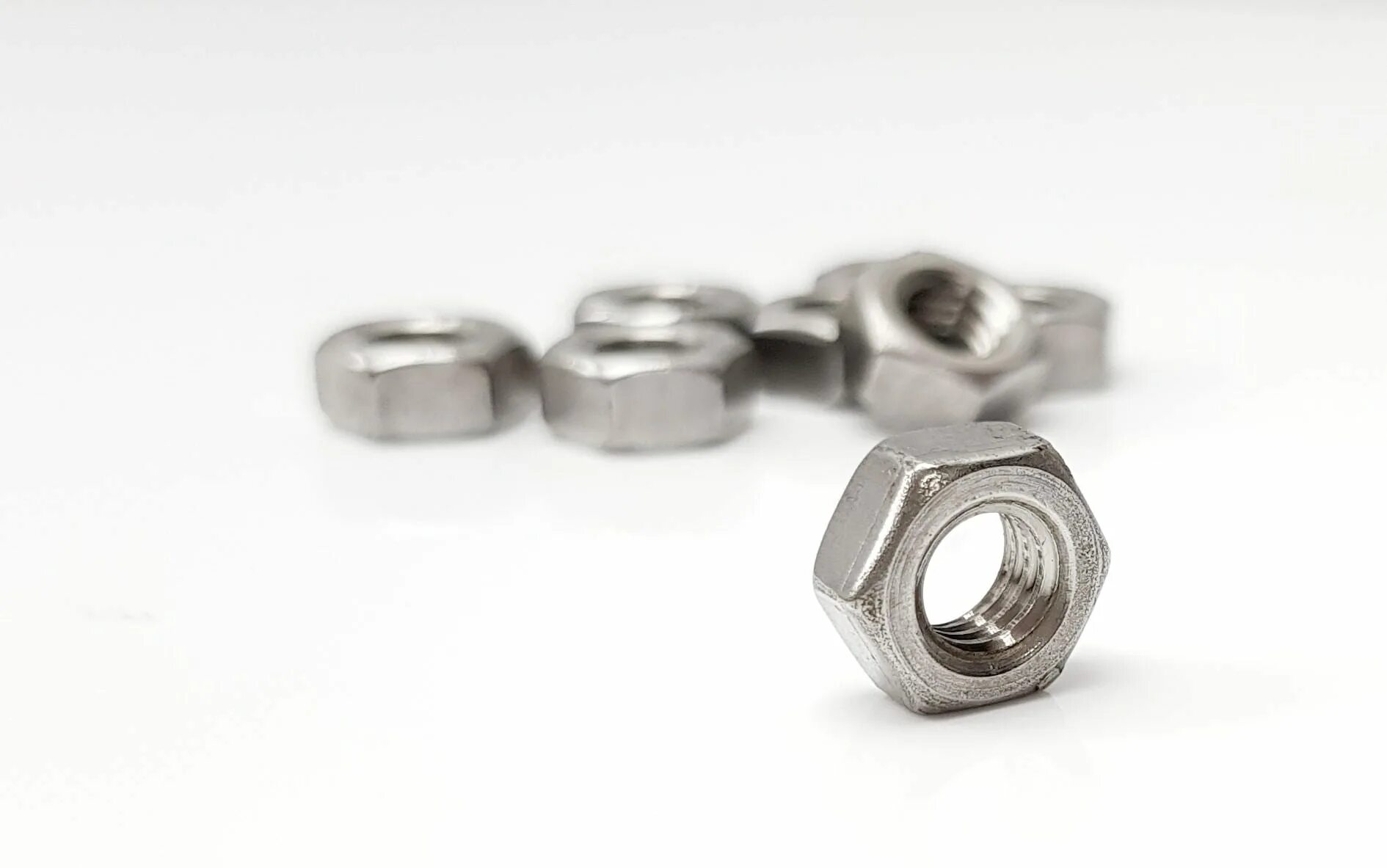 Гайка m4. Din 934. 9906014000 Nut. Hexagon nut Bolt logo.