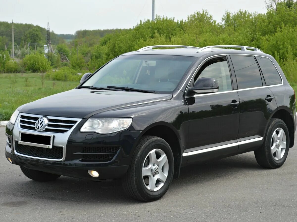 Фольксваген туарег б у. Фольксваген Туарег 2009. VW Touareg 2010. Volkswagen Touareg 2009 черный. Фольксваген Туарег 2009 дизель.