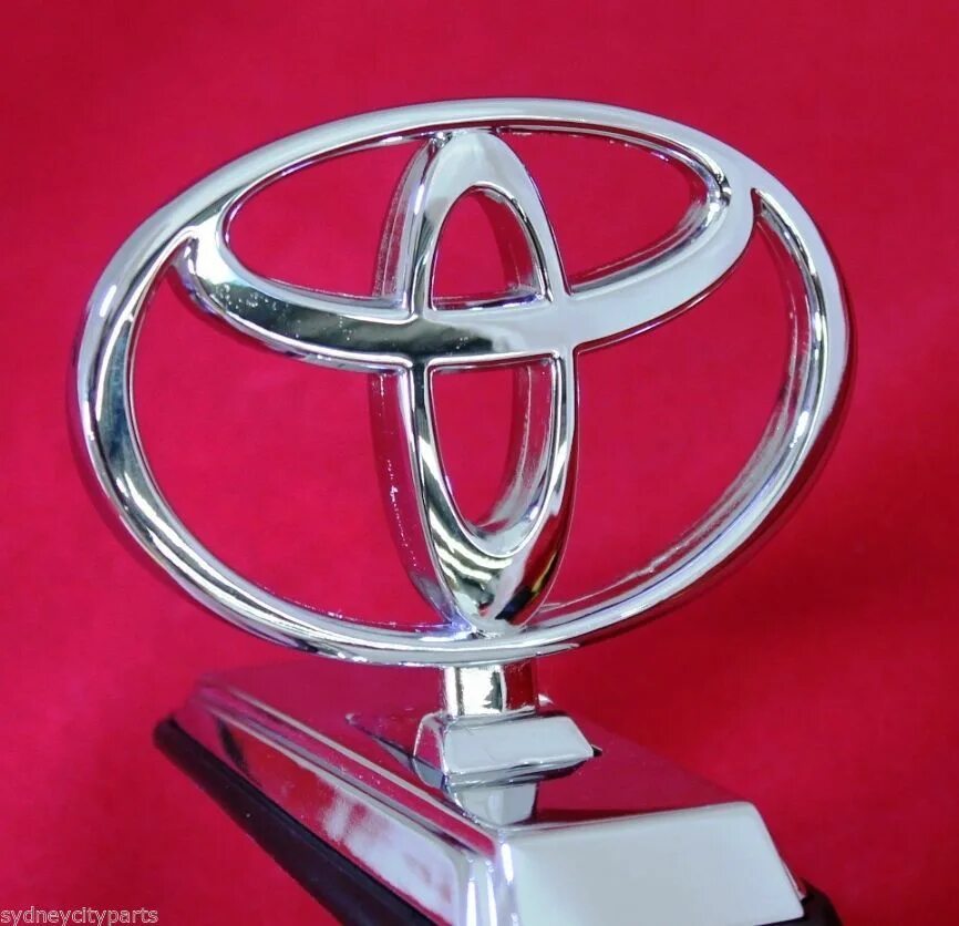 Toyota Emblem. Значок Toyota Land Cruiser. Эмблема на капот Toyota Land Cruiser. Прицел на капот Land Cruiser 80. Знак тойоты машины