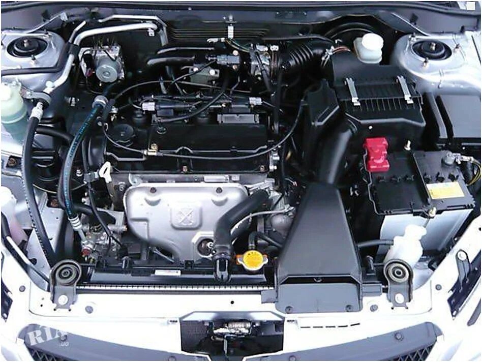 Насколько надежен двигатель. ДВС Mitsubishi Lancer 1.3 2006. Мотор Митсубиси Лансер 9 1.6. Mitsubishi Lancer 9 мотор 1.6. Двигатель Mitsubishi Lancer 9.