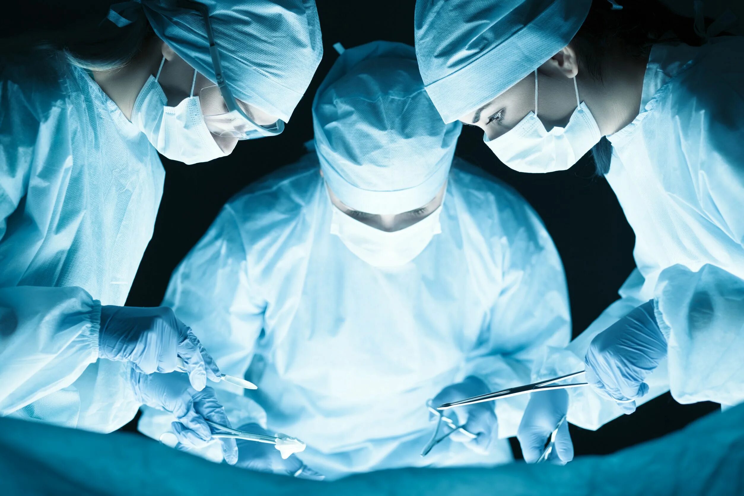 Surgeons performs operations
