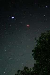 Красный огонек в небе