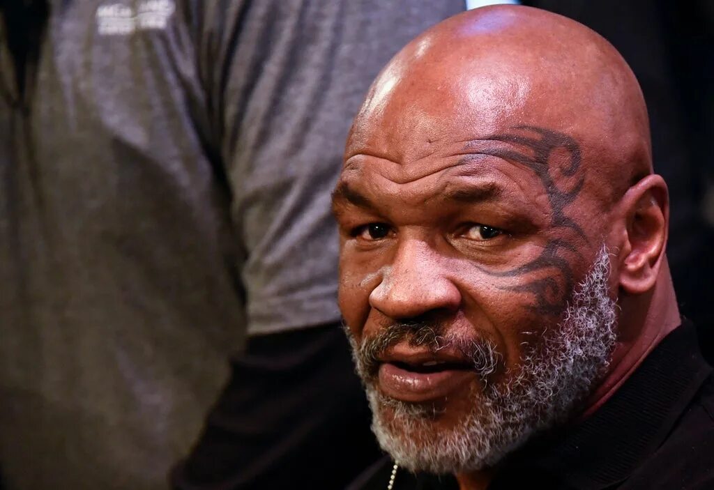 Mike Tyson plane fight sparked after 'passenger threw bottle at him'