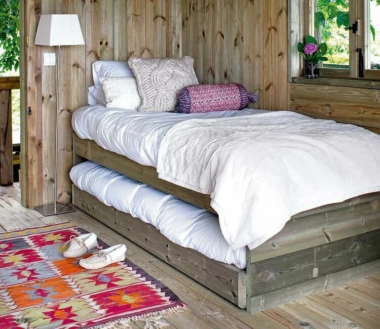 Colorful beds, with the pillows, in the Farmhouse, with the windows, with light 