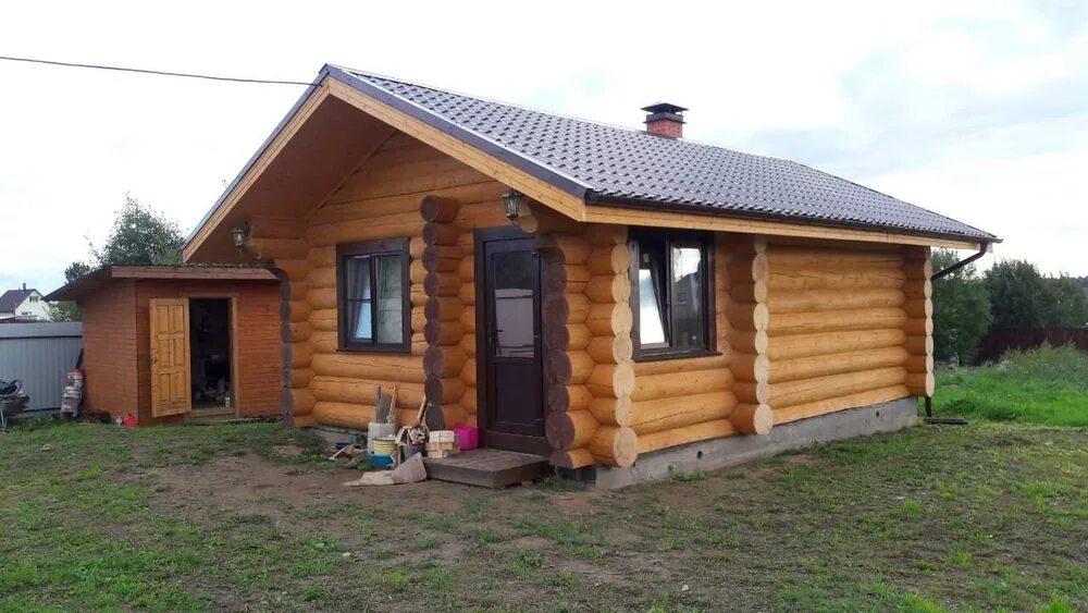 Срубы домов из бревна в нижегородской. Баня из оцилиндрованного бревна 6х4. баня сруб под ключ. баня из сруба под ключ. дом-баня из бревна под ключ.