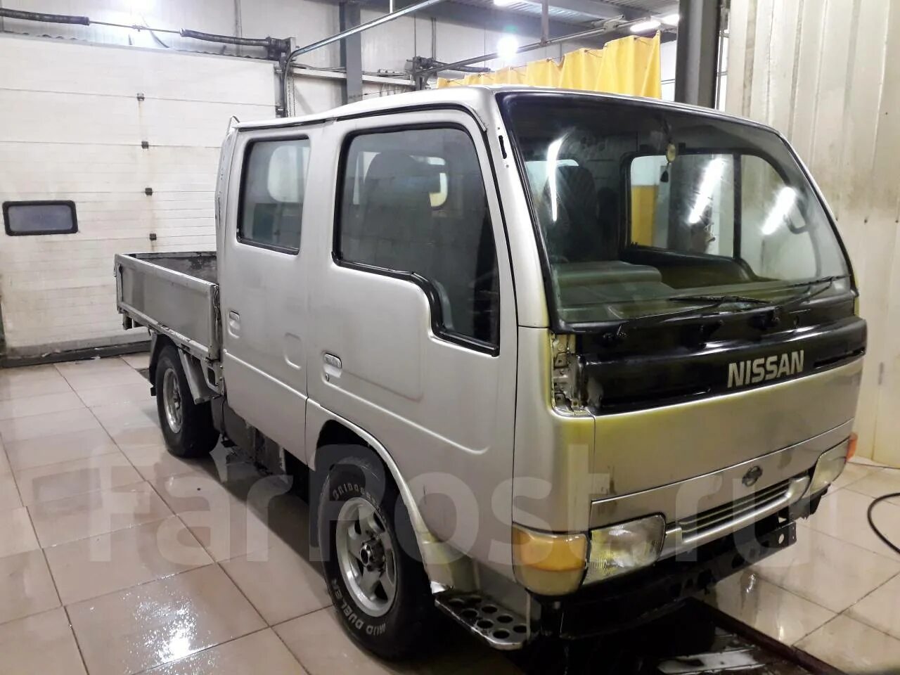 Бензиновый ниссан атлас. Nissan atlas 1993 грузовой бортовой. Nissan atlas 1993 грузовой бортовой. Как работает подъем кузова на ниссан атлас 200. Nissan atlas 2003.