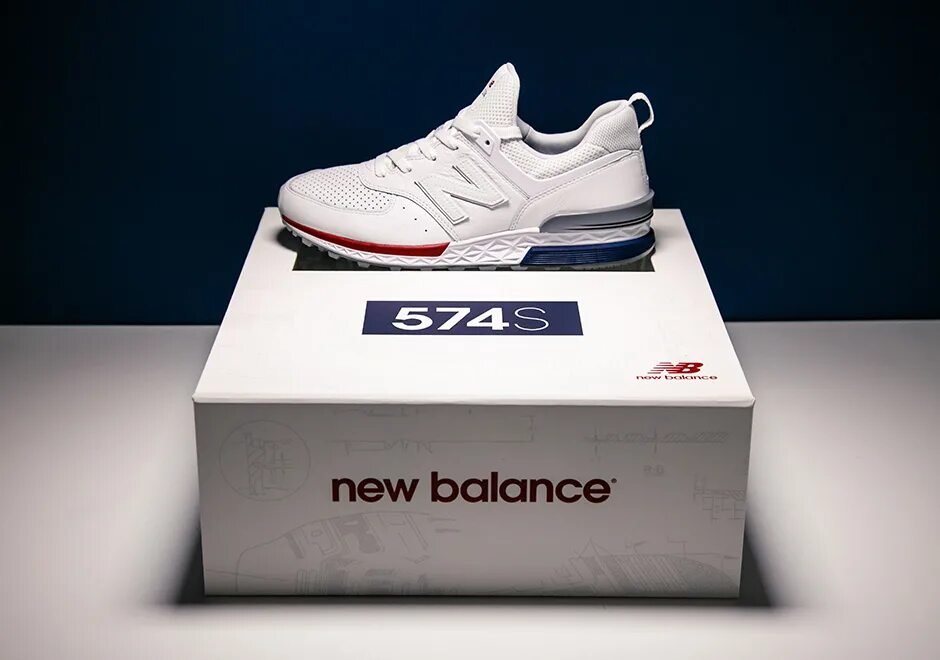 New balance история. New Balance бренд. Коробка Нью баланс оригинал. Слоган Нью баланс.