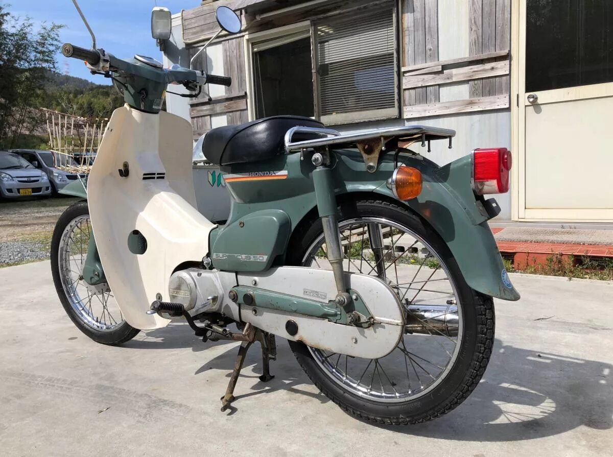 Купить хонда супер каб. Honda super Cub. Honda super Cub 50 Custom. Honda super Cub мотор. Honda super Cub aa04.